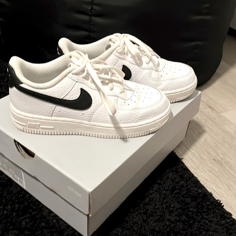 White and blue Air Force ones. Size 1Y like new. Worn once. Great condition.